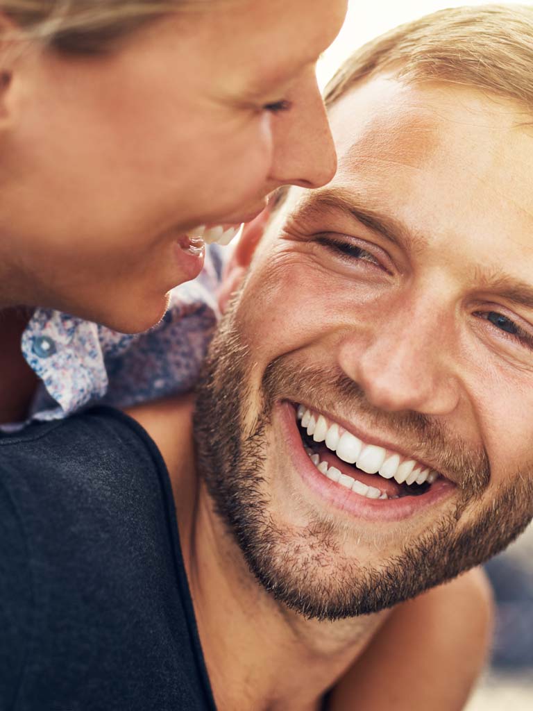Beautiful Smiling Couple with Nice Teeth