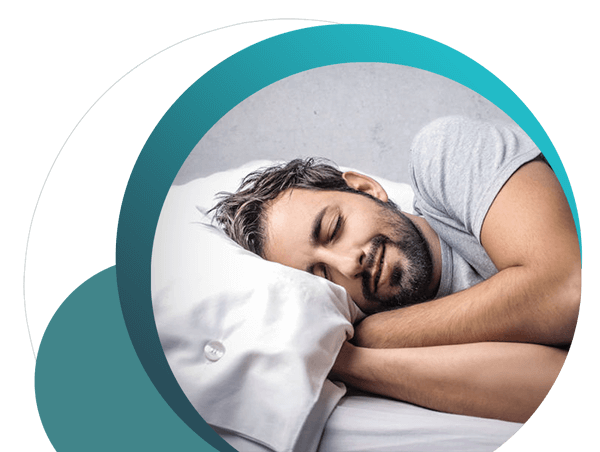 Man Sleeping With Sleep Apnea Oral Device